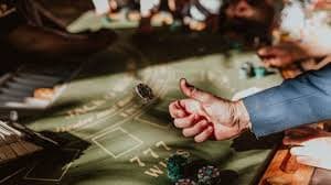 Antarmuka Grand Slam koitototo menampilkan meja baccarat langsung dengan dealer profesional dan statistik permainan real-time